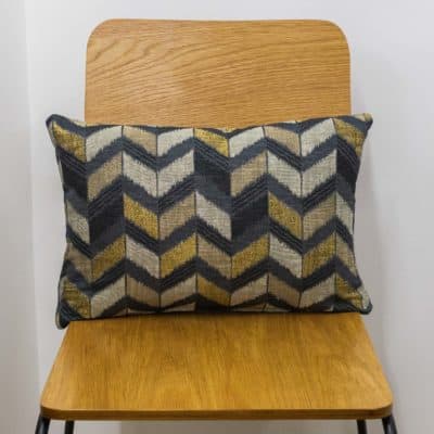 Luxe Chevron Boudoir Cushion in Black and Gold