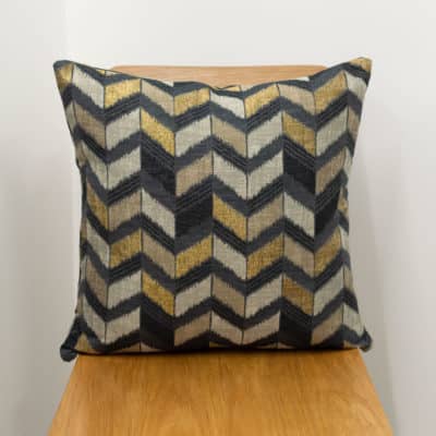 Luxe Chevron Cushion in Black and Gold