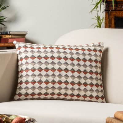 Argyle Boucle Boudoir Cushion in Burnt Orange