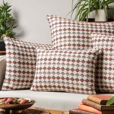 Argyle Boucle Boudoir Cushion in Burnt Orange