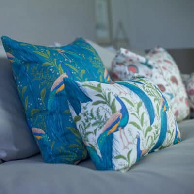 Vibrant Peacock Boudoir Cushion in Cream & Teal