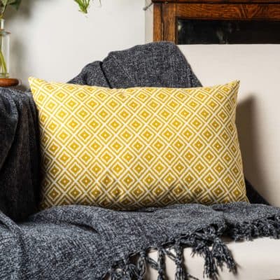 Scandi Ikat Boudoir Cushion in Ochre
