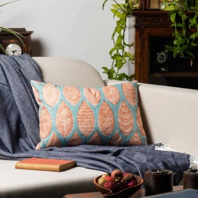 Indira Leaf Print Boudoir Cushion in Teal and Burnt Orange